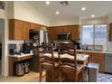 Well-lit kitchen with stainless steel appliances and wooden cabinets at 914 W Morelos St, Chandler, AZ 85225