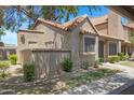 The side exterior of a charming house shows an exterior view with healthy green bushes at 3491 N Arizona Ave # 174, Chandler, AZ 85225