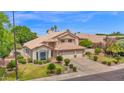 Delightful two-story home boasting a well-maintained lawn and a convenient three-car garage at 1292 N Renee Ave, Gilbert, AZ 85234