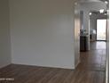 Bright entryway featuring a dining area, tile accents and a view to the backyard at 6620 W Shaw Butte Dr, Glendale, AZ 85304