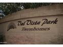 Val Vista Park Townhomes signage with stucco block wall at 1015 S Val Vista Dr # 52, Mesa, AZ 85204