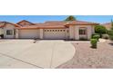 Charming home with a two-car garage and a well-maintained, expansive driveway at 2055 N 56Th St # 15, Mesa, AZ 85215