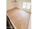 Bright living room with a ceiling fan, window, and light wood flooring at 225 N Standage -- # 45, Mesa, AZ 85201