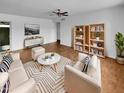 Bright living room featuring hardwood floors, modern furniture, and stylish decor elements at 2614 E Obregon St, Tempe, AZ 85288
