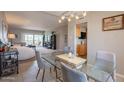 Spacious, open-concept living room with dining area and lots of natural light from the balcony at 3600 N 5Th Ave # 302, Phoenix, AZ 85013
