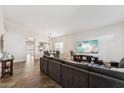 Spacious living room with tile floors, modern media center and comfortable furniture at 4314 E Anderson Dr, Phoenix, AZ 85032