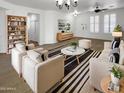 Bright living room features neutral tones, stylish furniture, and ample natural light at 5140 W Bent Tree Dr, Phoenix, AZ 85083