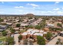 Aerial view of charming home in a quiet neighborhood at 9435 E Hobart Cir, Mesa, AZ 85207
