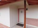 Inviting entryway with front door featuring diamond glass and a covered porch at 1019 E Granada Ave, Apache Junction, AZ 85119