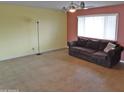Open living room featuring a ceiling fan and plentiful natural light at 1019 E Granada Ave, Apache Junction, AZ 85119