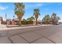 Well maintained single-Gathering home with mature trees and a tidy front yard at 1179 E Cordova Ave, Casa Grande, AZ 85122