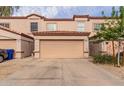 Two-car garage and driveway at 125 S 56Th St # 124, Mesa, AZ 85206
