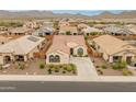 Aesthetic single-Gathering home with a tile roof and desert landscaping in a beautiful community near the mountains at 25947 W Oraibi Dr, Buckeye, AZ 85396