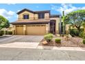 Charming two-story home with a three-car garage and well-maintained desert landscaping at 2758 N Sterling --, Mesa, AZ 85207