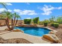 Resort-style pool and spa surrounded by lush landscaping and rock features at 2758 N Sterling --, Mesa, AZ 85207