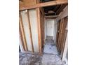 Bathroom under construction, showing exposed framing and partially tiled floor, ideal for custom design at 3125 N 82Nd Pl, Scottsdale, AZ 85251