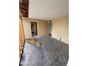 Bedroom showing interior demolition with exposed studs and unfinished flooring, ready for remodeling at 3125 N 82Nd Pl, Scottsdale, AZ 85251