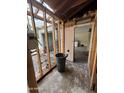 View of an interior being remodeled, with exposed framing and unfinished surfaces, highlighting the renovation process at 3125 N 82Nd Pl, Scottsdale, AZ 85251