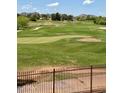 Stunning views of a well-maintained golf course showcasing the community's recreational amenities at 4303 E Cactus Rd # 235, Phoenix, AZ 85032