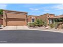 Charming home featuring a stucco exterior, mature landscaping and a two-car garage at 10838 N 10Th St, Phoenix, AZ 85020