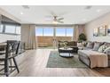 Open-concept living area with a dining table and backyard access at 2237 S Jacana Ln, Gilbert, AZ 85295