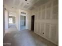 Spacious living room featuring neutral walls and pre-installation electrical outlets at 47705 W Moeller Rd, Maricopa, AZ 85139