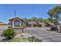 Olive Square community entrance with well maintained signage and landscaping at 7040 W Olive Ave # 94, Peoria, AZ 85345