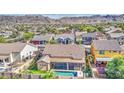 Aerial view of a single-Gathering home with mountain views and a swimming pool at 710 W Ardmore Rd, Phoenix, AZ 85041