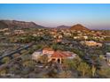 An aerial view of the property showcases its landscaping and proximity to mountain views at 8540 E Mcdowell Rd # 119, Mesa, AZ 85207