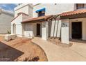 Exterior view showcasing the property's architecture, landscaping, and inviting entrance at 2121 W Union Hills Dr # 113, Phoenix, AZ 85027
