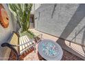 Cozy outdoor patio with desert landscaping, fire pit, and seating offers a tranquil space at 2524 S El Paradiso Dr # 82, Mesa, AZ 85202