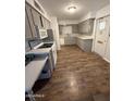 Functional kitchen featuring modern appliances, updated countertops, and stylish cabinetry at 5517 E Boise St, Mesa, AZ 85205