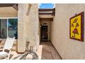 Charming entryway featuring tiled flooring, and decorative tile art, leading to a cozy home at 560 W Duke Dr, Tempe, AZ 85283