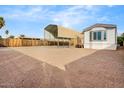 Manufactured home featuring a large carport and low maintenance landscaping at 853 S Evangeline Ave, Mesa, AZ 85208
