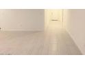 Open floor plan featuring sleek tile flooring, and neutral paint at 4747 S Carver --, Mesa, AZ 85212
