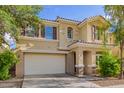 Charming two-story home featuring a neutral color scheme, tile roof, and a well-maintained front yard with mature trees at 6337 W Valencia Dr, Laveen, AZ 85339