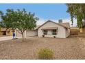Front lawn features low maintenance desert landscaping at 908 W Mohawk Ln, Phoenix, AZ 85027