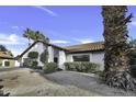 Well-maintained single-story home with a tile roof and desert landscaping in a sunny location at 1441 W Sea Haze Dr, Gilbert, AZ 85233