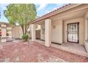 Inviting covered entrance with security door and well-maintained landscaping at 14801 N 25Th Dr # 2, Phoenix, AZ 85023