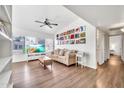 Open-concept living room featuring wood floors and bright natural light at 14801 N 25Th Dr # 2, Phoenix, AZ 85023