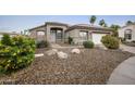 Inviting single-story home boasting desert landscaping, and mature plants to enhance curb appeal at 15064 N 54Th Way, Scottsdale, AZ 85254