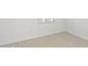 Neutral bedroom featuring light tile flooring and white baseboards at 17854 W Mission Ln, Waddell, AZ 85355