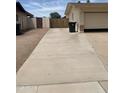 Long driveway offering ample parking and convenient access to the garage at 108 E Jasmine St, Mesa, AZ 85201