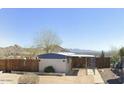 Cozy home with covered patio and privacy fence set against beautiful mountain views at 13013 N 18Th St, Phoenix, AZ 85022