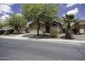 Charming single-story home featuring a two-car garage and mature landscaping in a suburban neighborhood at 1742 E Chaparral Dr, Casa Grande, AZ 85122