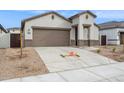Charming single-Gathering home featuring a two-car garage, neutral stucco and rock landscaping at 17806 W Vogel Ave, Waddell, AZ 85355