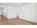 Spacious living room featuring tile flooring and ample natural light at 17806 W Vogel Ave, Waddell, AZ 85355