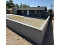Cozy home with a covered front porch and xeriscaped yard offering easy maintenance at 1915 W Missouri Ave, Phoenix, AZ 85015