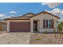 Charming single-Gathering home featuring a well-maintained yard and a two-car garage at 25332 N 133Rd Ave, Peoria, AZ 85383