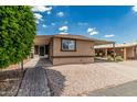 A single-story home with covered parking and low-maintenance desert landscaping at 6812 N Polk St # 223, Phoenix, AZ 85043